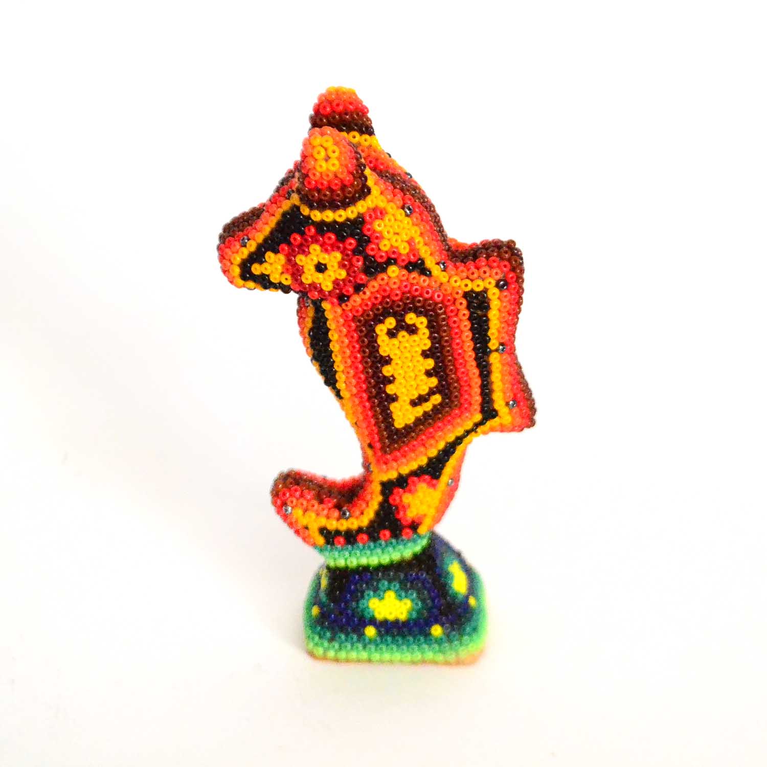 Cavalo marinho arte Huichol