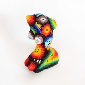 Golfinho intervém na arte Huichol