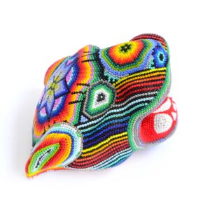 Cabeza de jaguar en arte huichol